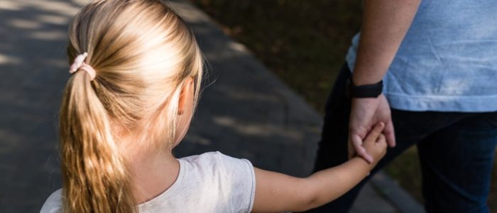 nominated-little-girl-with-blonde-hair-holding-hand-her-father-and-walking-in-the-park_t20_E4476Z (1)